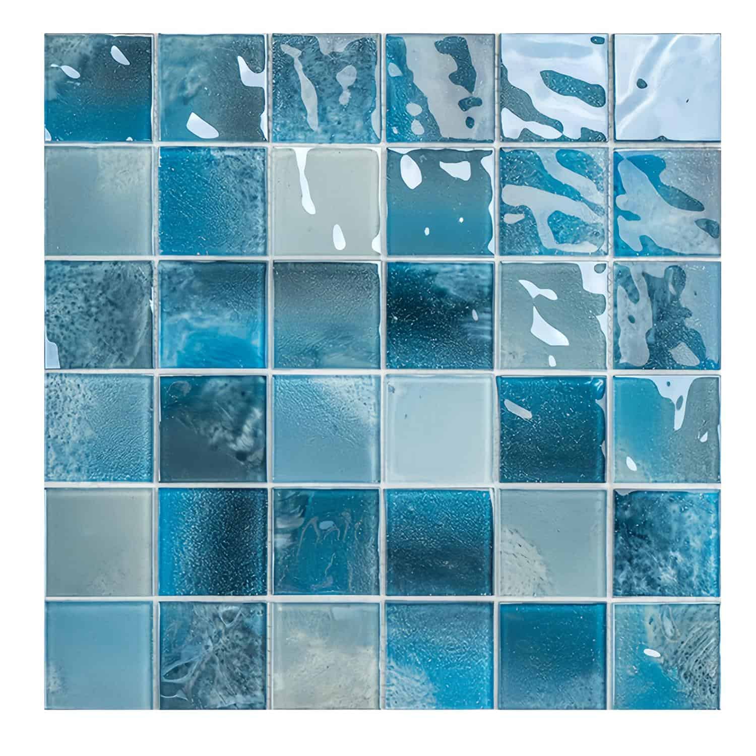 Vibrant blue glass mosaic tile with glossy, textured surface and irregular patterns.
