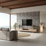 Neutral mosaic tile wall with textured surface and mixed shades of gray and beige.