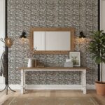 Textured mosaic tile wall in neutral tones with a rustic, natural finish and intricate pattern.