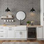 Gray textured tile backsplash with a matte finish, complementing white cabinetry and black fixtures.