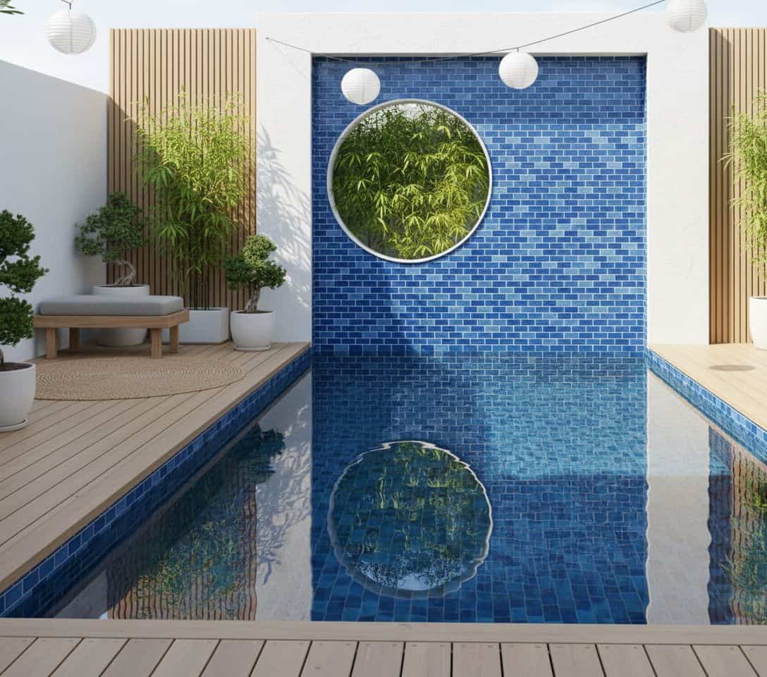 Blue mosaic tiles with glossy finish and textured surface.
