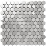 White marble hexagon tiles with polished finish and subtle gray veining.