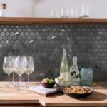 Gray hexagon tile wall with matte finish and textured surface.