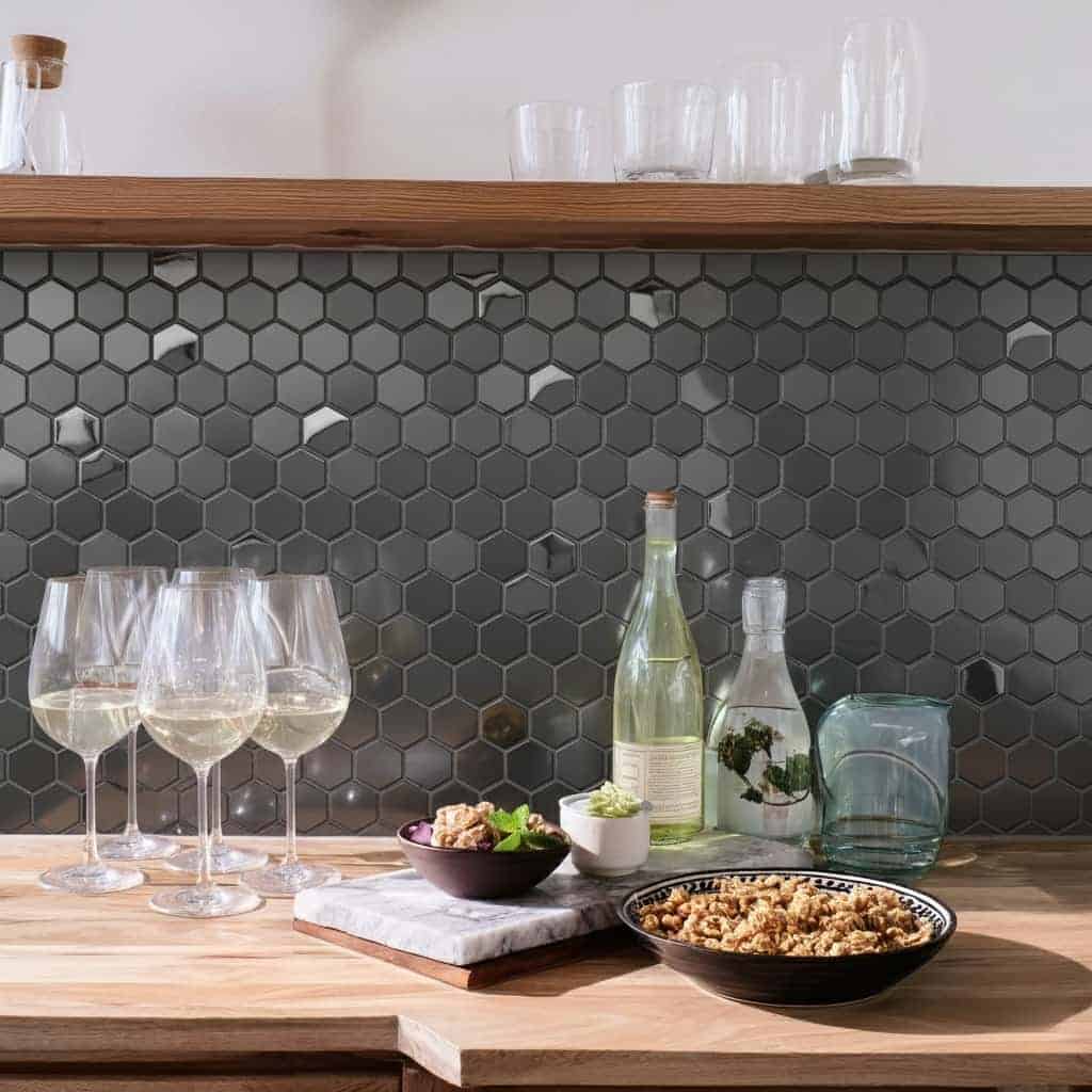 Gray hexagon tile wall with matte finish and textured surface.
