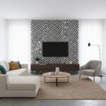 Bright, geometric black and white tile wall with textured finish.