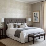 Neutral beige textured wall tile in a bedroom setting, creating a calm and sophisticated ambiance.