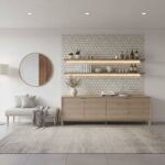 Bright, minimalist living room with light wood furniture and a geometric patterned accent wall.