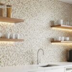 Beige mosaic tile with textured surface, small square pattern, used as a kitchen backsplash.