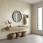 Neutral-colored mosaic tile wall with small square tiles, textured surface, in a modern entryway.
