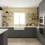 Bright yellow mosaic tile with textured surface in kitchen.