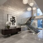 Gray textured ceramic tiles with a matte finish, complementing the contemporary interior design and creating a sophisticated.