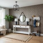 Brown mosaic wall tile with textured surface, used as an accent wall in a modern living room.
