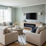 Light gray mosaic tile with textured surface on living room wall, complementing neutral furniture and modern decor.