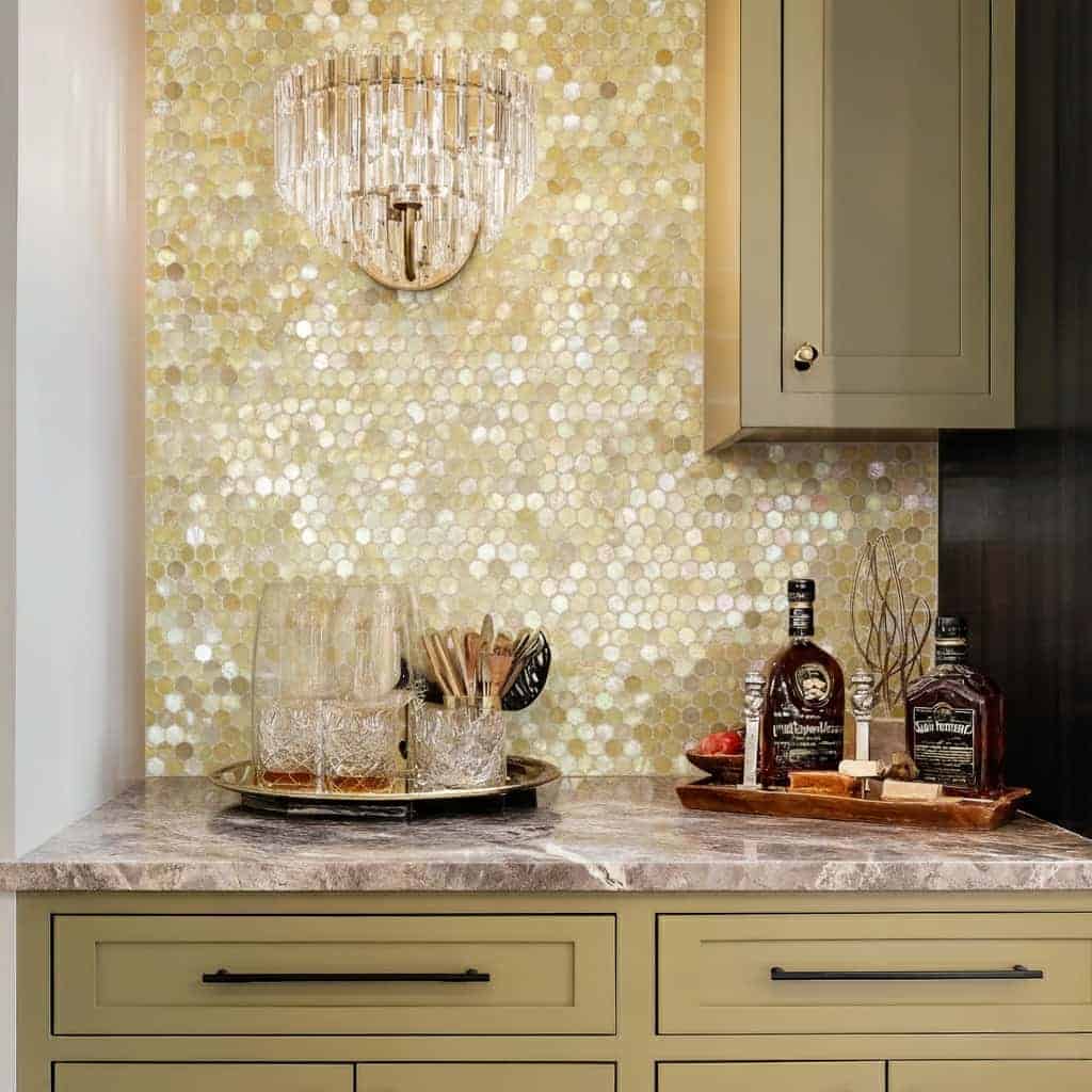 Gold hexagon mosaic tile with a glossy, reflective surface.