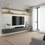 Gray textured wall with floating shelves and a sleek TV stand.