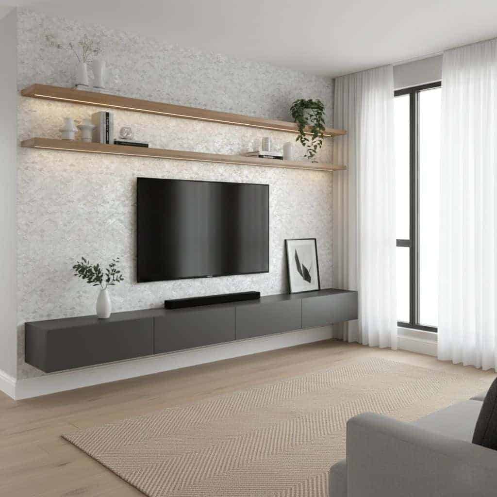 Gray textured wall with floating shelves and a sleek TV stand.