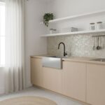 Beige tile backsplash with a smooth, matte finish in a contemporary kitchen setting.