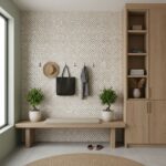 Beige mosaic tile wall with textured surface, used as a decorative accent in a cozy entryway.