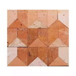 Warm terracotta-colored textured tiles with geometric pattern.