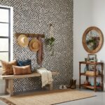 Decorative mosaic tile wall in neutral tones.