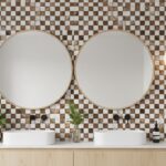 Bright checkered tile wall with brown and beige tones, textured surface, and a contemporary design.