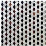 Colorful geometric tile design with white, black, and brown shades.