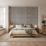 Black and white geometric patterned wallpaper with a textured finish in a bedroom.