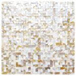 White mother-of-pearl mosaic tile with smooth, shiny surface and intricate pattern.