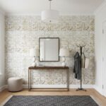 Neutral mosaic tile wall with textured, multi-tonal finish, adding a modern and elegant touch to the entryway.