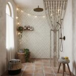 Bright bathroom with beaded curtain, terracotta tiles, and natural accents.