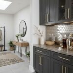 Gray hexagon tiles with a matte finish on kitchen backsplash.