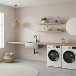 Light beige speckled wall tiles with a smooth texture, used in a modern laundry room setting.