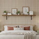 Soft beige wall tiles with textured surface and subtle pattern, complemented by modern decor and warm lighting.
