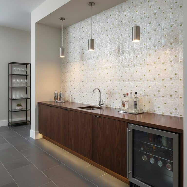 White and gold mosaic tile wall with textured surface in a modern kitchen setting.